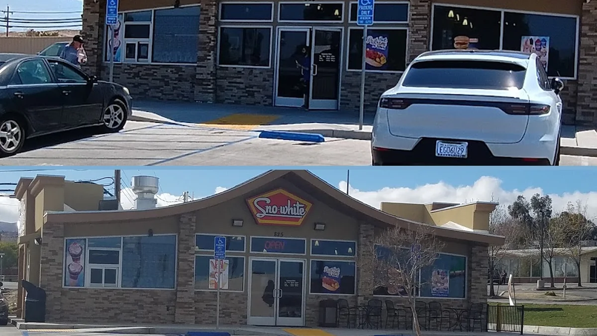 Restaurant entrance with car park and signage