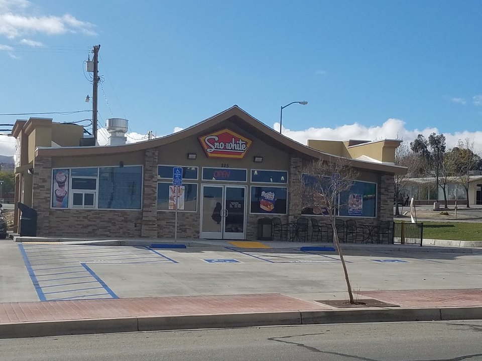 Drive-in restaurant exterior with parking spaces